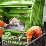 men-garbage-truck-city-container-collection-service-public-pollution-recycling-waste-management-trash-community-worker-teamwork-plastic-new-york-junk-refuse-dirt-min