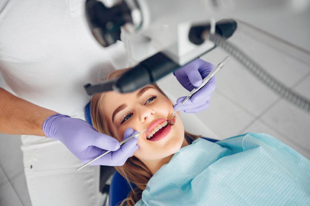 beautiful-girl-sitting-dentist-s-office-min