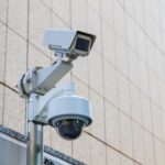 security-camera-metal-beam-modern-office-building-min